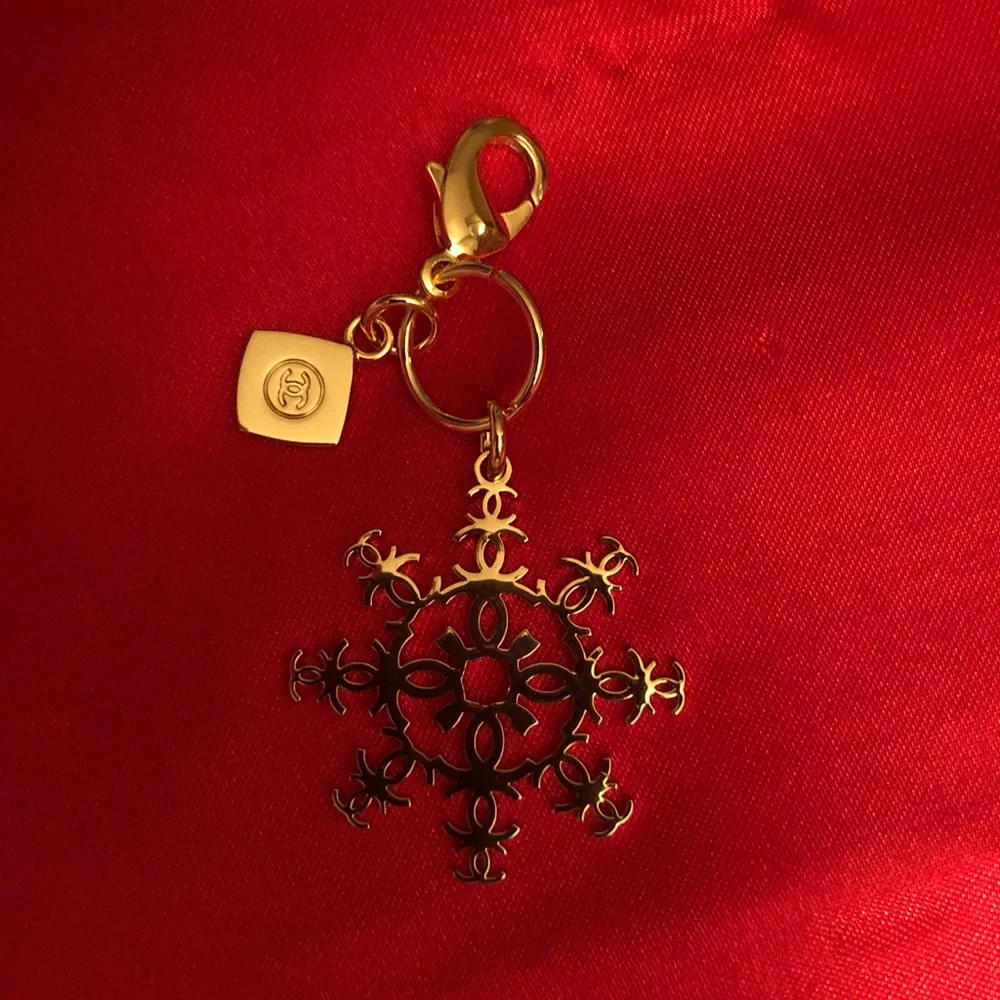 CHANEL Gold-Tone Snowflake Charm